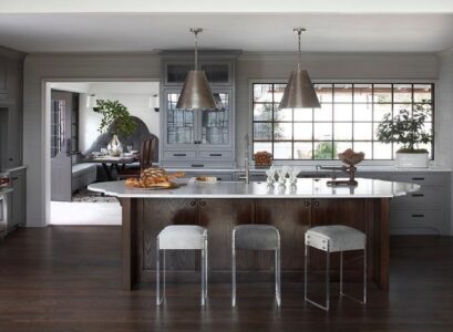 gray-kitchen-cabinets-and-beautiful-oval-island