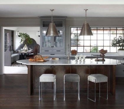 gray-kitchen-cabinets-and-beautiful-oval-island