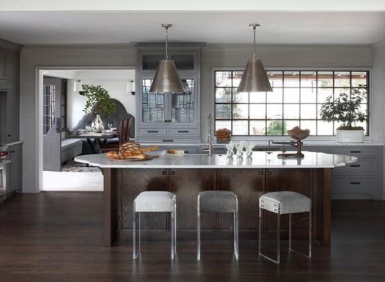 gray-kitchen-cabinets-and-beautiful-oval-island