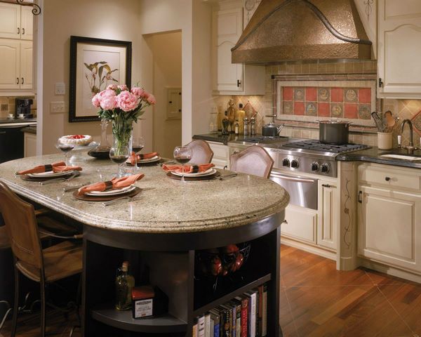 modern kitchen with oval island and seating