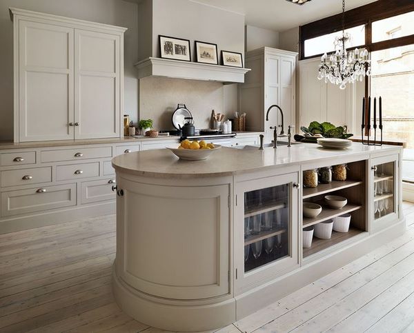 oval kitchen island with open shelves traditional style interior