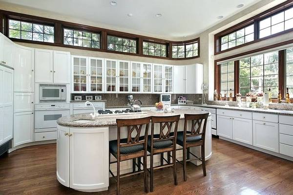 oval kitchen island with seating white cabinets 