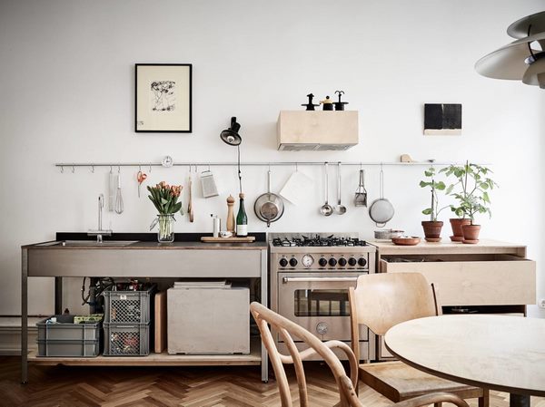 scandinavian kitchen design with horizontal wall railing