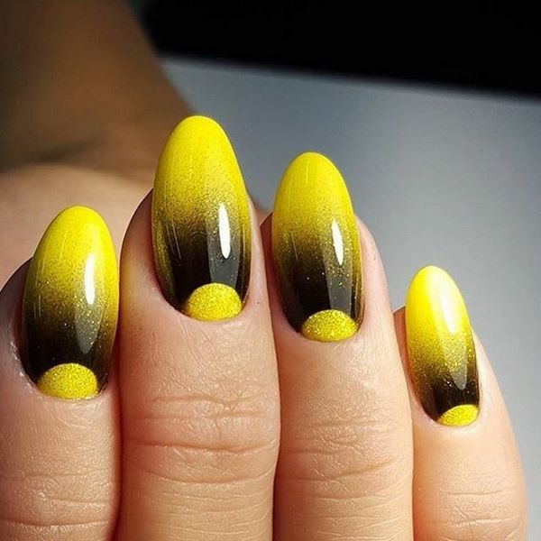 stylish yellow and black nail art