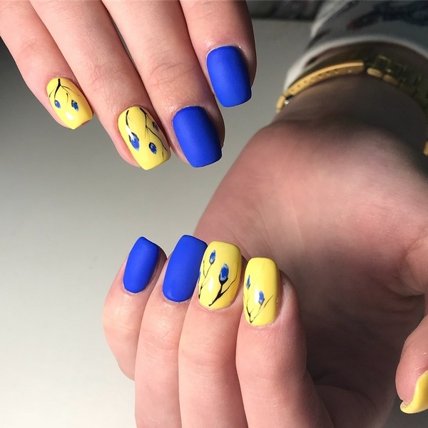 yellow and blue manicure with matte finish