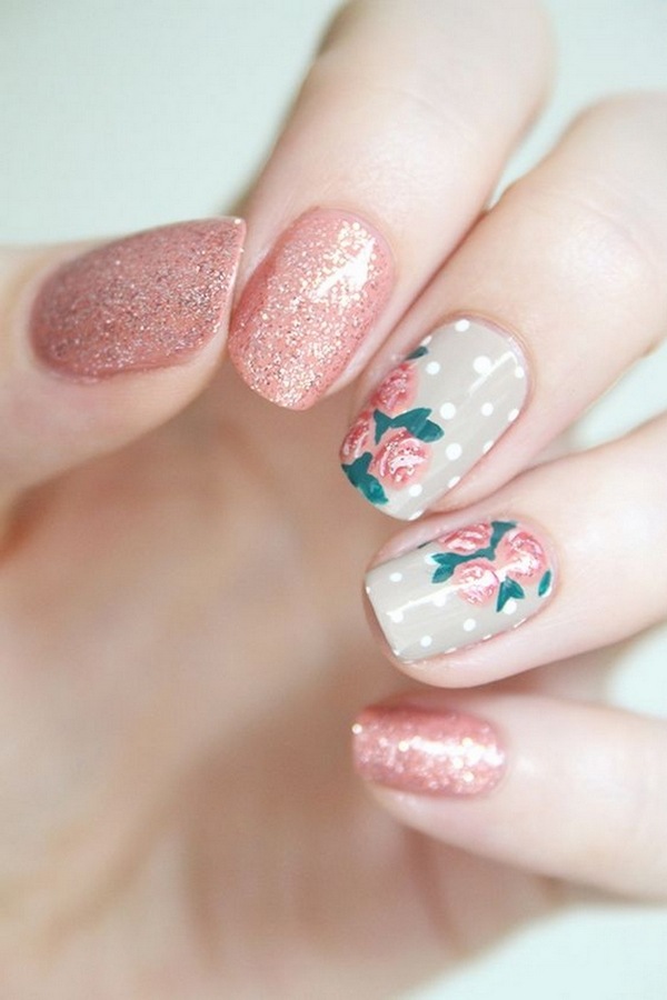 Glitter and polka dot nail design with floral decoration