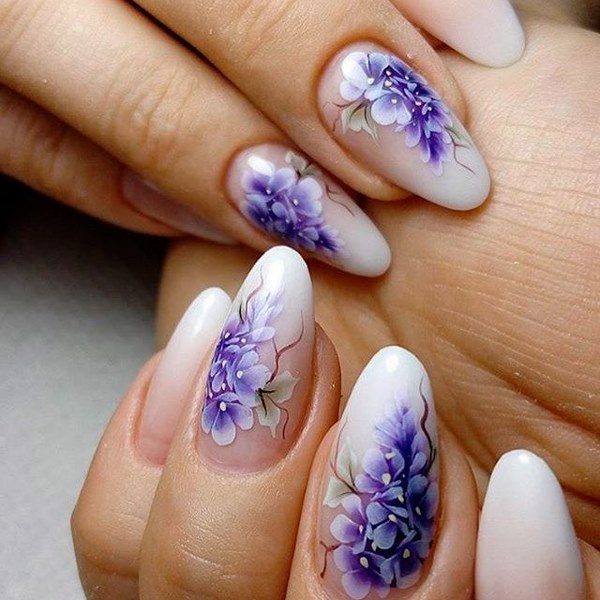 almond nail shape manicure ideas with beautiful floral pattern 