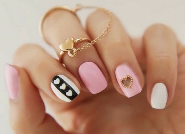 elegant nail design in pink and white with hearts