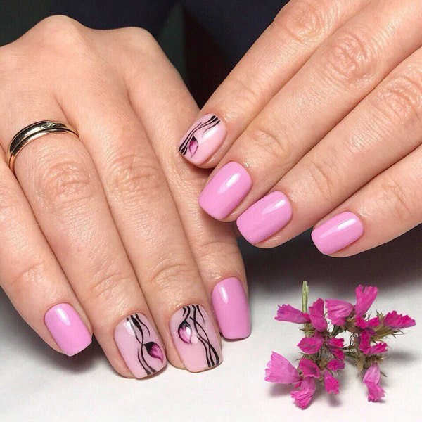 gorgeous spring manicure in pink with tiny flowers