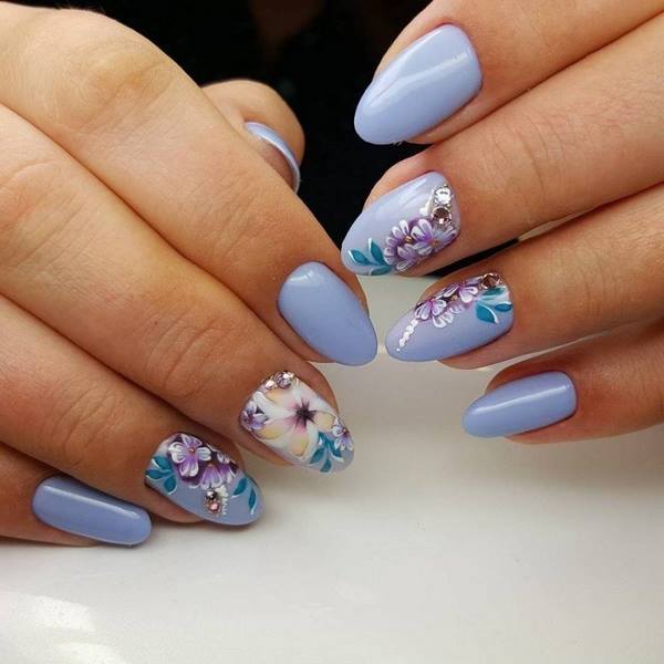 pastel blue nail art with floral pattern spring manicure