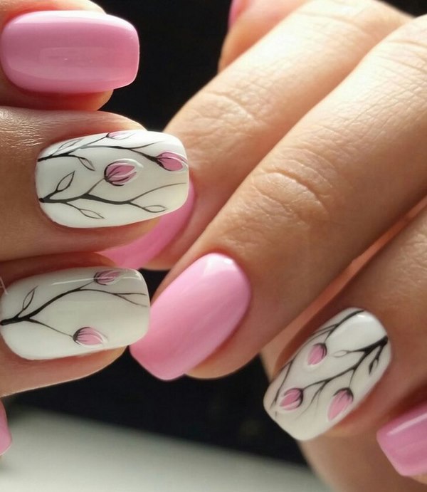 pink and white manicure with delicate flower buds pattern