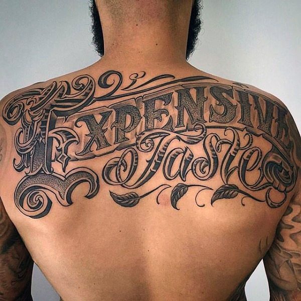 Upper back tattoo ideas for men inscriptions