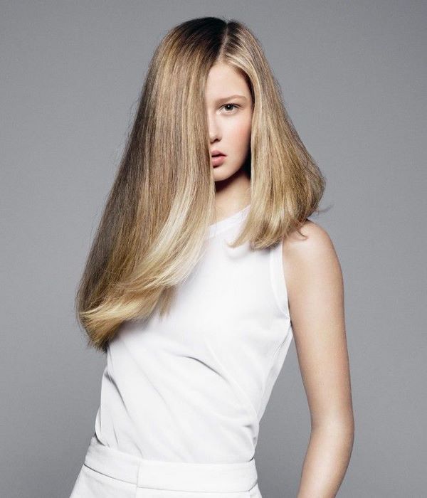 asymmetrical long hairstyle with side part