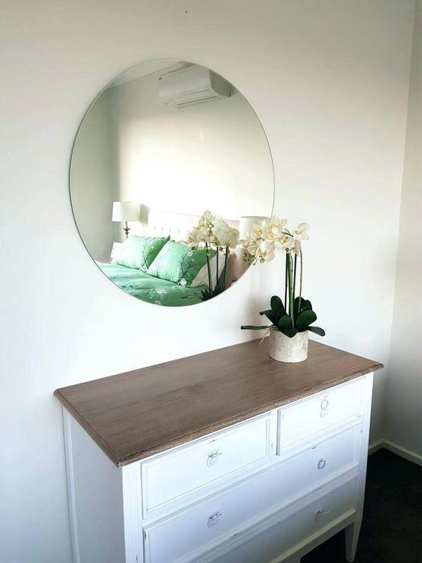 wall mounted vanity mirror in bedroom