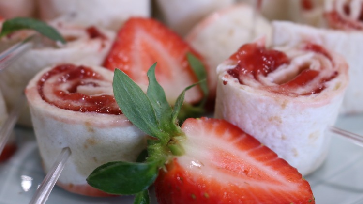 Fruit rolls with cream cheese and strawberry jam