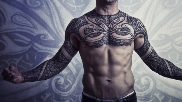 Unique Celtic tattoos on chest and arms