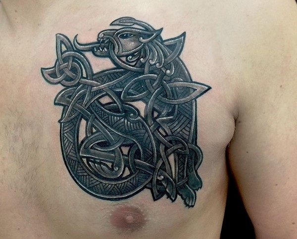 chest tattoo celtic style dragon design