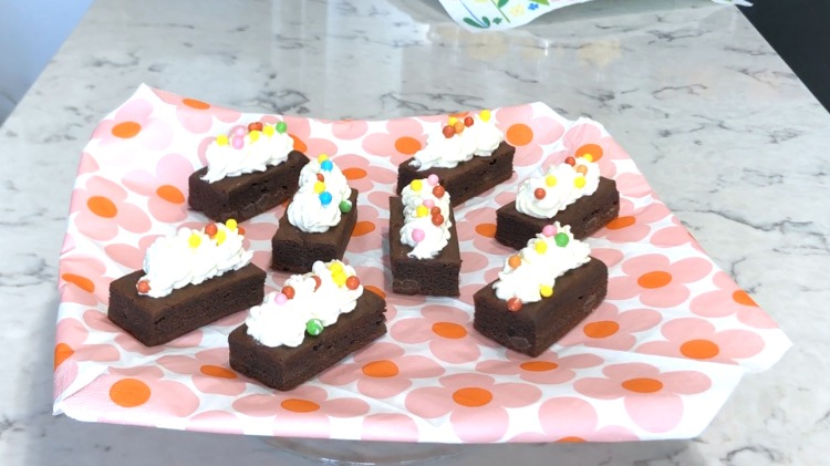 chocolate brownies with whipped cream glaze