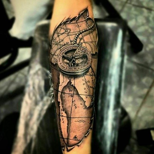 compass and map forearm tattoo for men