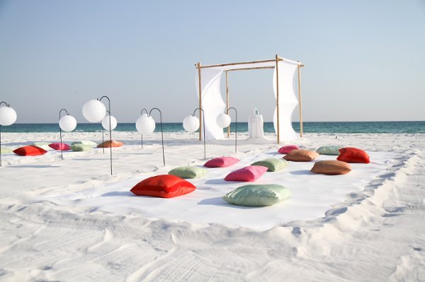 creative and original beach wedding ideas with arch and pillows