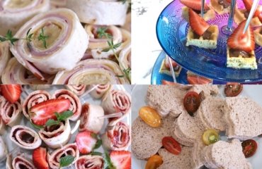 finger-food-snacks-tortilla-rolls-with ham-and-cheese-decorated-with-parsley-or-thyme-tile