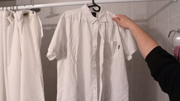 how to remove wrinkles without an iron hang clothes in the bathroom