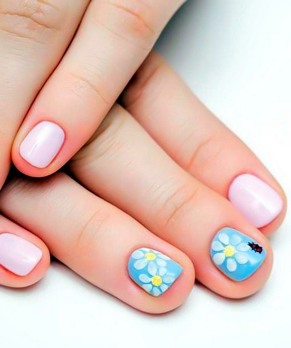 Idea for children manicure in soft pink and blue with flowers