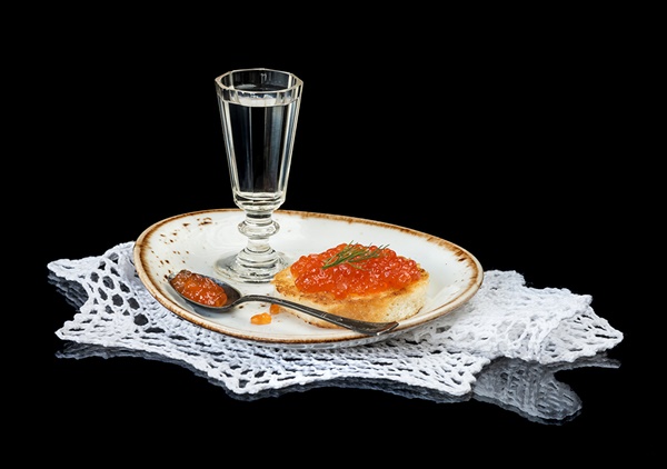 Vodka toasted bread and caviar on a plate
