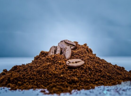 closeup-ground-coffee-and-beans