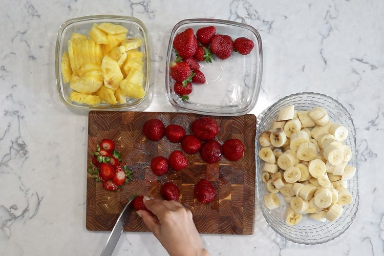 ingredients for nice cream banana strawberry and pineapple