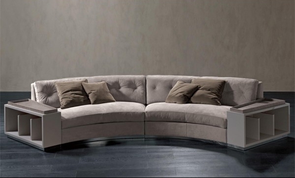 modern curved sofa with tufted back and storage niches