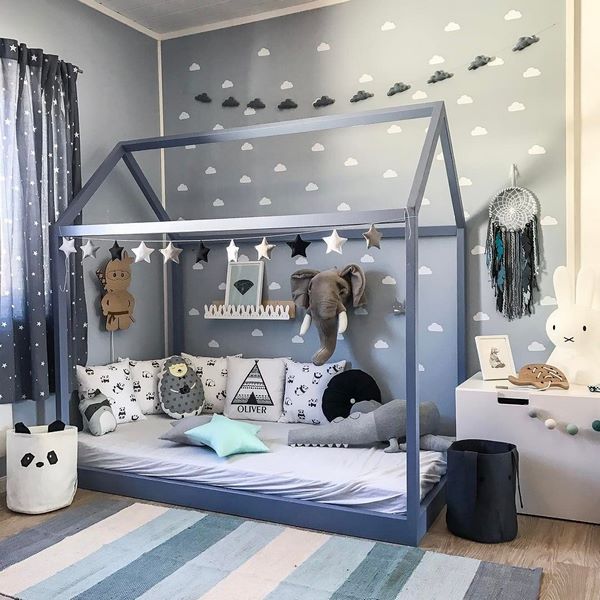 nursery room design ideas in gray colors and low house bed