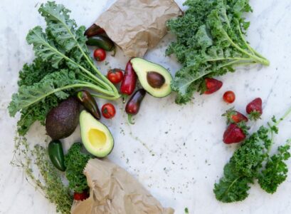 vegetables-and-fruits-from-organic-cultivation-green-leaves-avocado-paprika-strawberries-cherry-tomatoes-and-cress