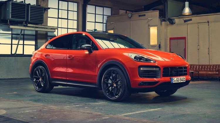 Front look of Porsche cayenne coupe in red with black alloy wheels