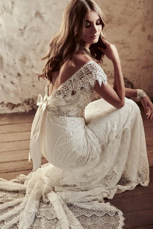 beautiful and romantic wedding dress lace and satin ribbon