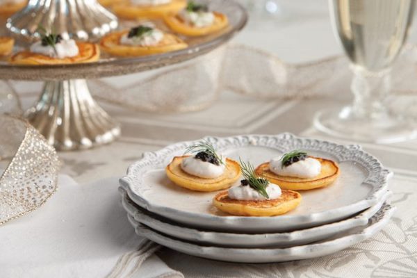 mini pancakes with sour cream and caviar