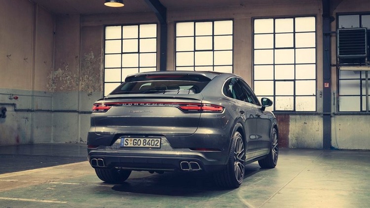 porsche cayenne coupe in gray with modern rear lights and double exhausts 