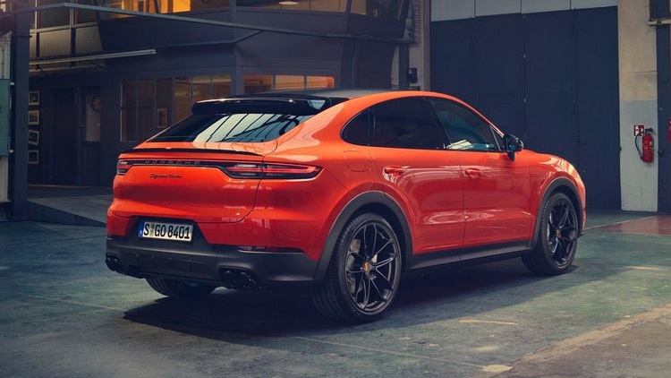 porsche cayenne coupe in red with black alloy wheels