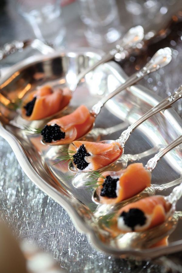 stylish and elegant appetizers delicacy black caviar and salmon roll bites