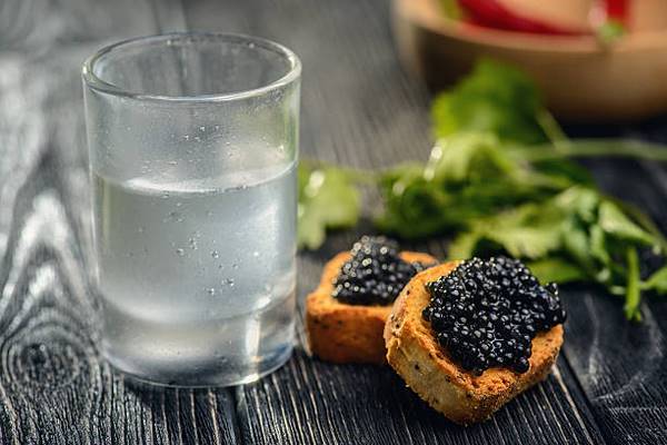 toasted bread with caviar and vodka
