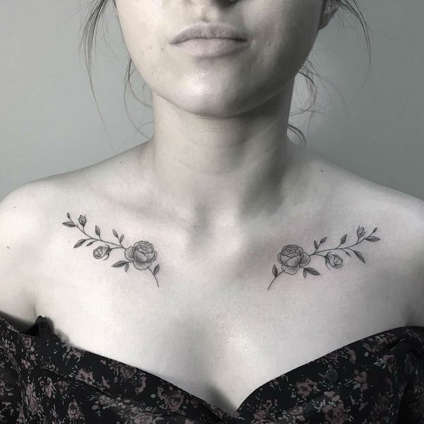 delicate feminine tattoos on clavicle