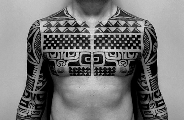 masculine symmetrical tribal style chest tattoo
