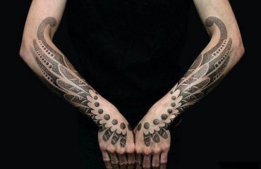 symmetrical-arm-tattoos-tribal-style-forearm-ideas