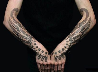 symmetrical-arm-tattoos-tribal-style-forearm-ideas