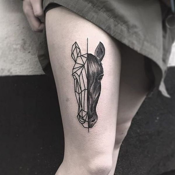symmetrical tattoo on thigh horse