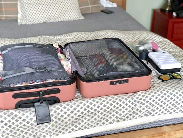 Space saving luggage organizers to pack suitcase