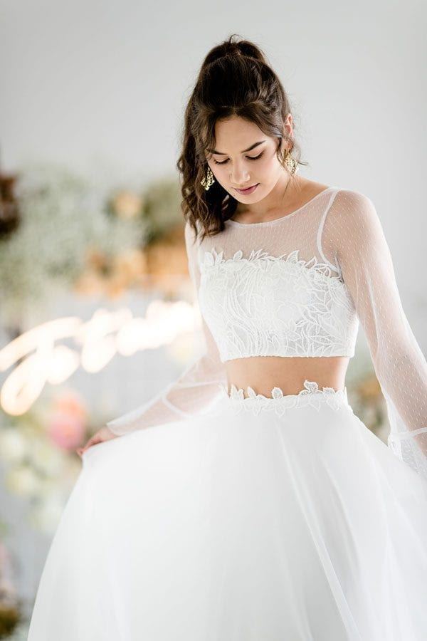 crop top with long sleeves and airy skirt wedding dress ideas