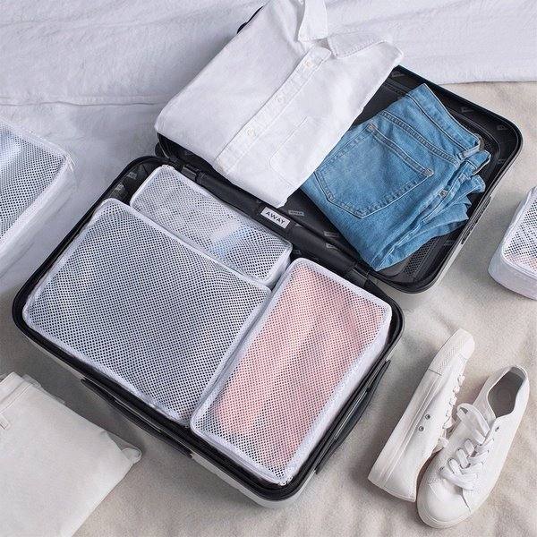 how to pack suitcase travel light luggage organizers