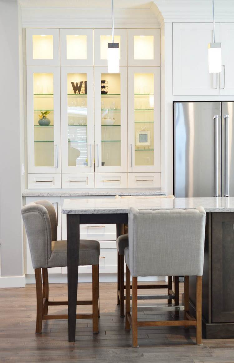 modern white kitchen cabinets with glass front doors