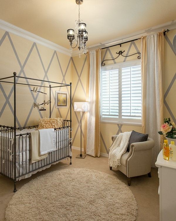 round carpet in baby room decorated in neutral colors